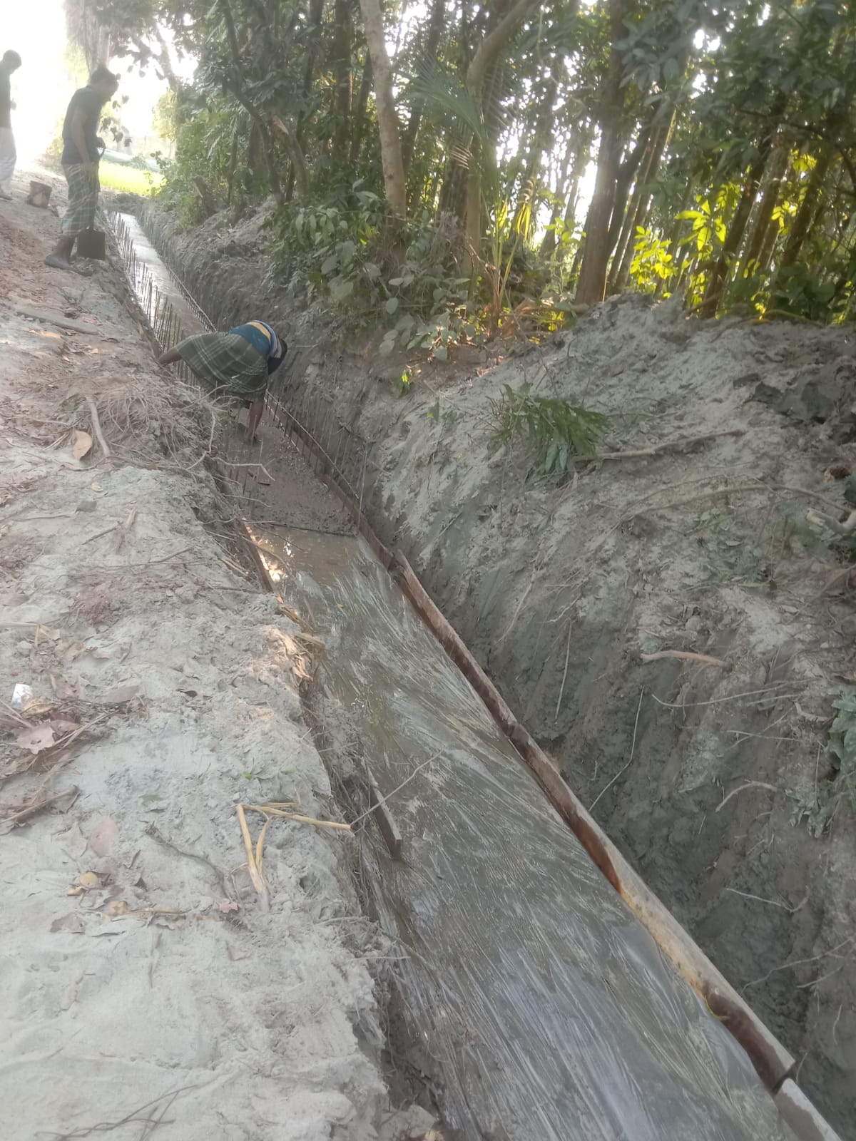 Concrete drain under construction near Miyaji Khamar